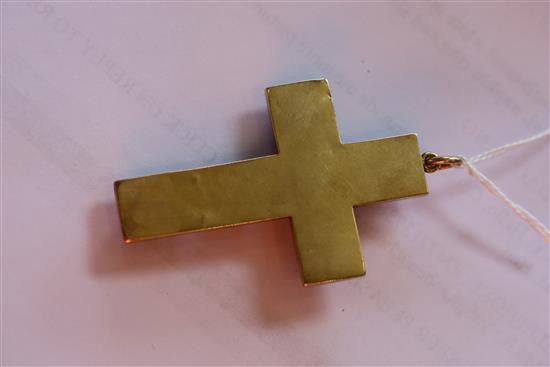 A late 19th century yellow metal and six stone cabochon garnet set cross pendant, 6cm, gross 15.4 grams.